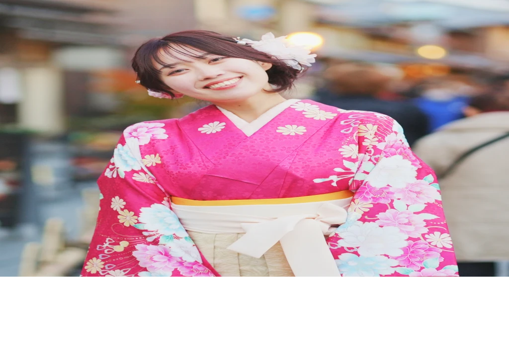 ピンクの着物と袴姿の女性